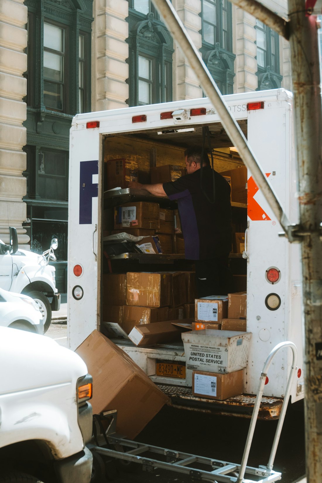 The family-owned Ness Junk Removal crew loading the truck
